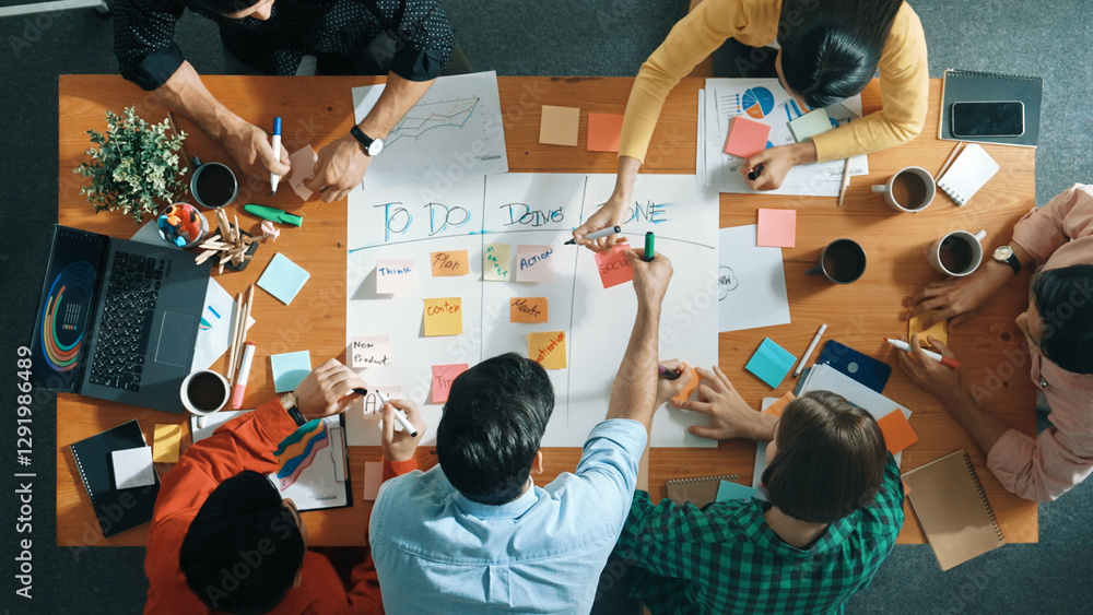 Poster top down aerial view of business team making scrum task board at meeting room. group of people writi
