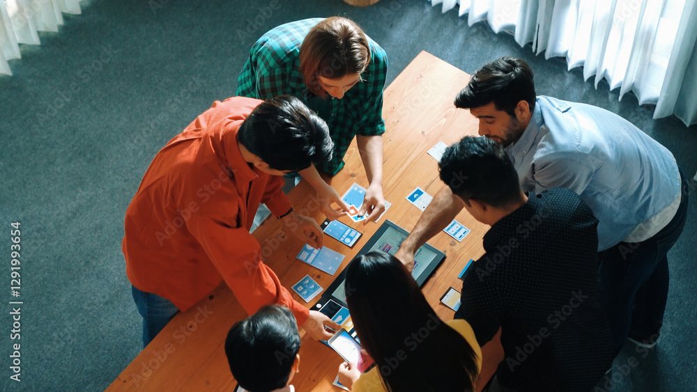Poster top down view of team working together to compare and plan ux ui design. creative diverse business p