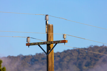 Photograph of the top section and associated cables and connectors of an old and deteriorating...