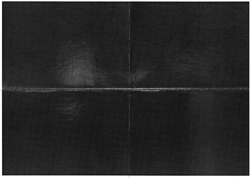 scan of paper with deep folding mark.