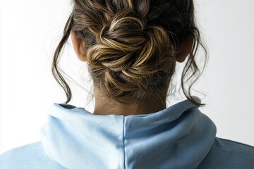 Obraz premium A young woman from Uruguay is positioned with her back to the camera against a chroma key background, looking to the side