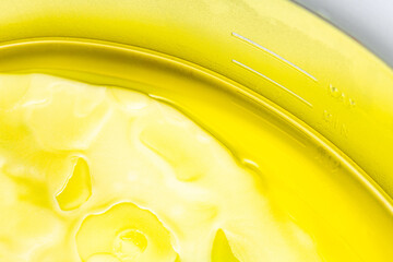 melting paraffin in a wax machine, close-up. melted wax. melted paraffin. paraffin melting bath