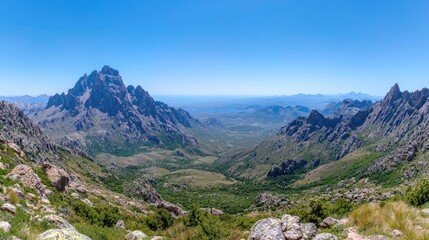 Naklejka premium Mountain View Panorama, Valley Below, Sunny Day, Scenic Landscape, Outdoor Adventure