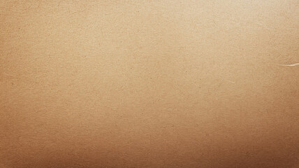 Smooth brown paper texture with subtle natural color variations, soft lighting, and organic imperfections for artistic backgrounds and designs.