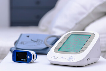 Electronic blood pressure monitor and pulse oximeter. Health care concepts.