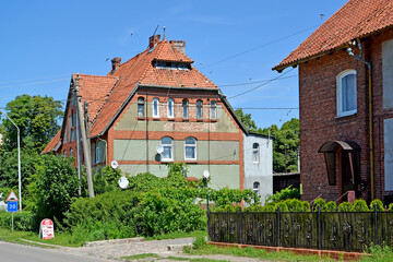 KALININGRAD REGION, RUSSIA - JUNE 27, 2016: Residential building with a hip roof, pre-war building. Yantarny village