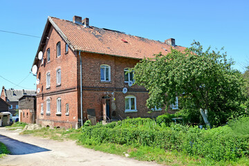 KALININGRAD REGION, RUSSIA - JUNE 27, 2016: Old brick residential building, pre-war building....
