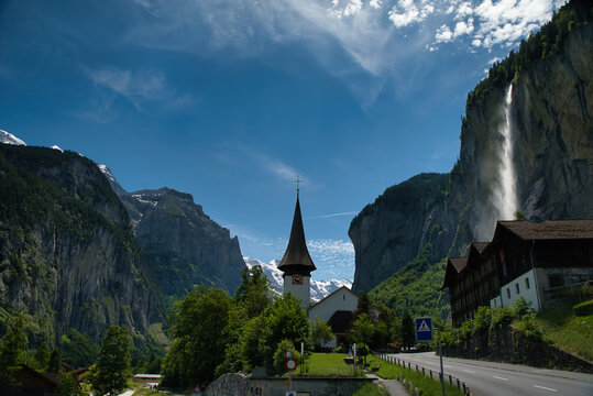 The Staubbach waterfall is a waterfall of the Staubbach and its amazing village with its famous church in Lauterbrunnen, in the Swiss Bernese Oberland region. 