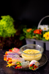 Homemade veggies spring rolls with asiatic sauces