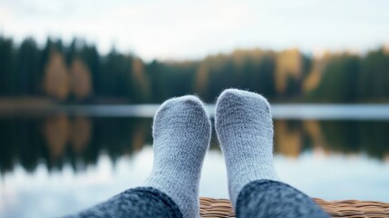 Feet in Wool Socks Relaxing by Lake
