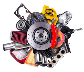 Various car automotive spare parts are arranged in an artistic display behin sport disc brake with...