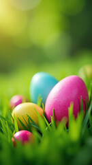 vibrant easter eggs sit among vibrant green grass blurred