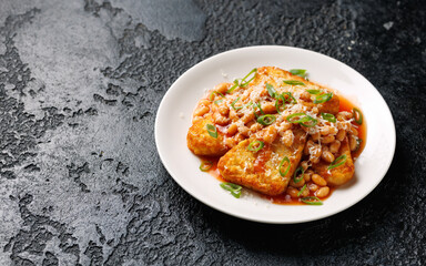 Loaded Hash Browns with baked beans and cheese