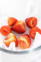 Washed and Dried Strawberries Neatly Stored in a Glass Bowl
