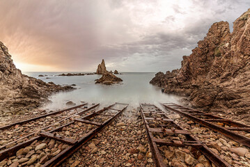 The Sirens Reef is a set of rock formations that emerge vertically from the Mediterranean Sea within the Cabo de Gata Natural Park in Almeria.
