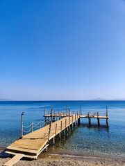 a beautiful large pier on the seashore