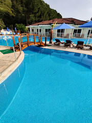 a beautiful large swimming pool near the house