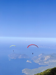 beautiful landscape with a view of the sea flying on a paraglider