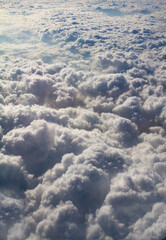 beautiful thick clouds in the sky from the height of the plane