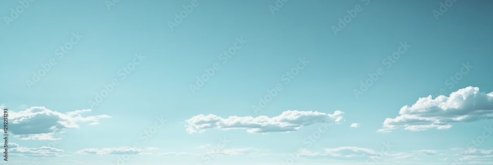 Aufkleber Bright blue sky with fluffy white clouds gently floating in the afternoon light above a serene landscape. Generative AI