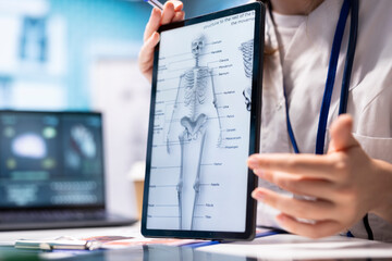 Healthcare professional shows lab test results to patient at consultation, discussing about...