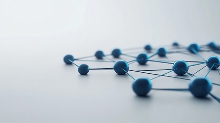 Abstract illustration of interconnected blue spheres with lines on a smooth surface representing network connections