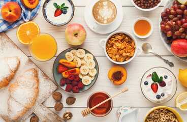 Rich continental breakfast menu background. Delicious natural food for tasty morning meals on wooden table, traditional european buffet
