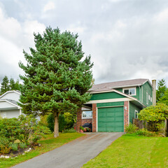 Two story luxury house with beautiful summer  landscape in Vancouver, Canada, North America. Day time on June 2024.