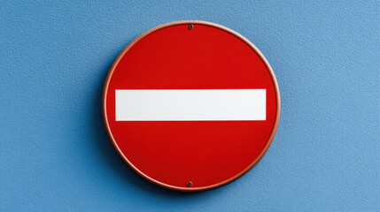 Fototapeta premium Red no entry road sign on blue wall, symbolizing restriction and caution