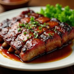 Tender grilled spare ribs glistening with sauce , ribs, top view