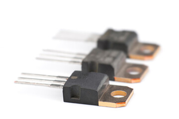 Close-up view of electronic components on a white background showcasing technology details