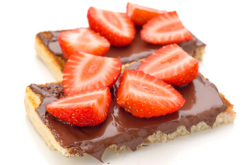 Delicious toasted bread topped with rich chocolate spread and fresh strawberries