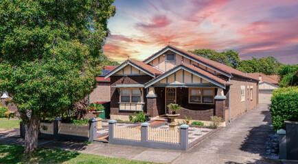 Old Federation Double Brick house in an inner western Sydney Suburb at beautiful colourful sunset NSW Australia