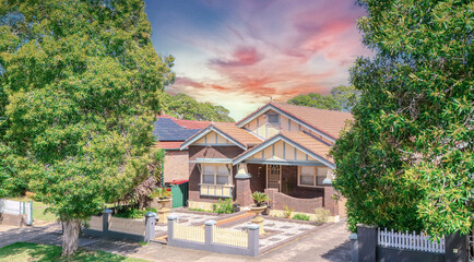Old Federation Double Brick house in an inner western Sydney Suburb at beautiful colourful sunset NSW Australia