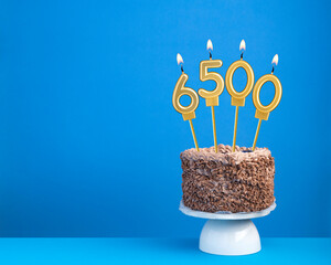 Candle number 6500 - Number of followers or likes.