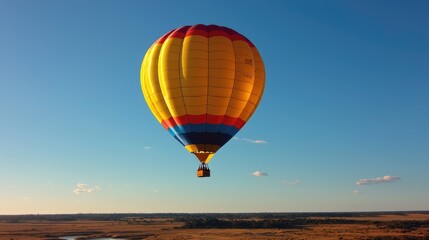 Fototapeta premium Hot air balloon flight over rural landscape at sunset