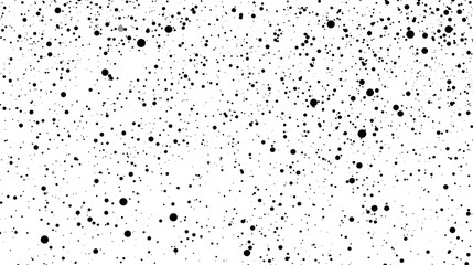 Obraz premium A white background covered with small black circular dots