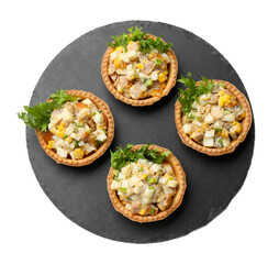 Tartlets with delicious filling isolated on white, top view