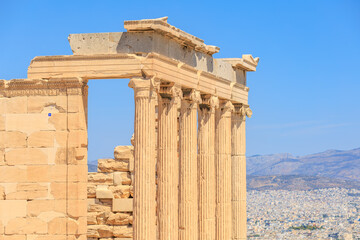 A beautiful view of a city with a large building in the background, Acropolis in Athens