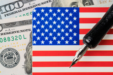American flag and currency with fountain pen detail