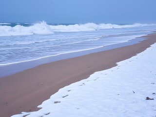  Snowy Beach at Winter s Edge with Cold Sand and Powerful Waves Crashing