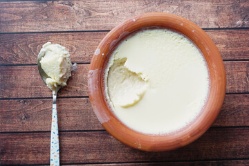 Enjoy creamy yogurt being served in a cozy restaurant setting