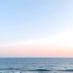  Subtle Blush and Blue Tones Creating a Soft Ocean Horizon, Providing a Calm Seaside View