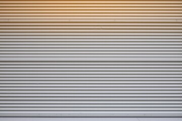 Fototapeta premium a close up of a fire hydrant in front of a metal door