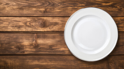 clean white plate on rustic wooden table, perfect for serving meals or displaying food. simplicity of design enhances natural beauty of wood
