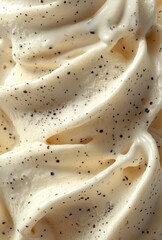 Creamy Vanilla Soft Serve Ice Cream with Flecks of Vanilla Bean, Ideal for Desserts and Summer Treats in a Close-Up View
