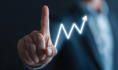 Businessman Pointing at Growth Chart with Light Effect