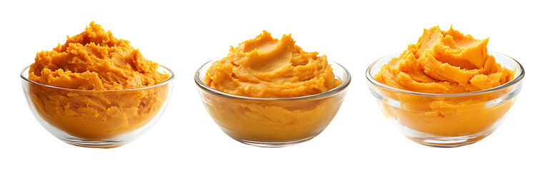 Collection of whipped mashed sweet potatoes served in a glass bowl isolated on a white or transparent background.