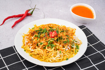 curry laksa with rice noodles. Laksa is a type of noodle dish with spices typical of Peranakan culture that combines Chinese and Malay. Asian traditional soup.