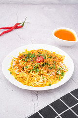curry laksa with rice noodles. Laksa is a type of noodle dish with spices typical of Peranakan culture that combines Chinese and Malay. Asian traditional soup.	
